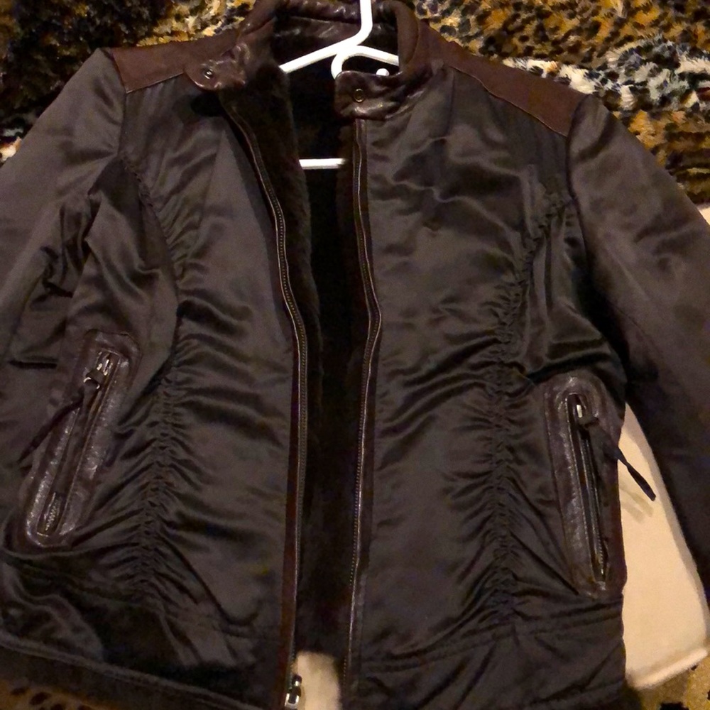 Like new highly styled reversible leather/rabbit fur jacket.